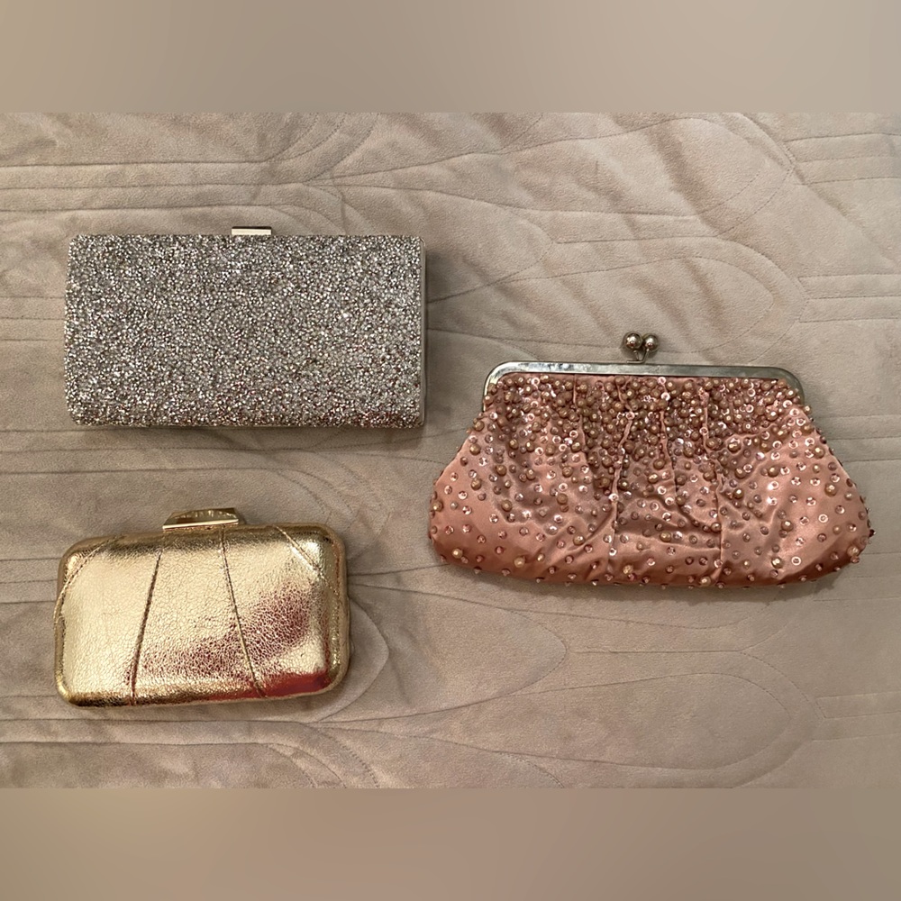 3 gold, pink, & silver clutches